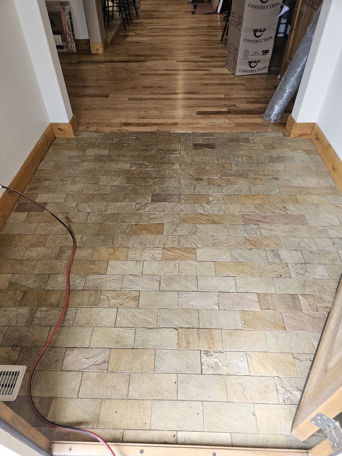 Stone tile cleaning entryway